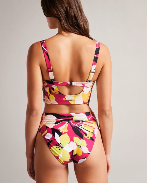 MARTHYA-Swimwear-Make a splash this summer with our gorgeous MARTHYA bikini bottoms. Their vibrant floral print is perfectly complemented by contrasting piping. Wonderfully versatile, you can pair them with the matching top or mix and match for a look that's all your own.The fabric of this product is made with 78% recycled polyamide. Using recycled polyamide helps divert plastic waste from ending in landfills. Bikini bottoms High waisted Floral print Contrast piping Logo engraved hardware Matching top avail